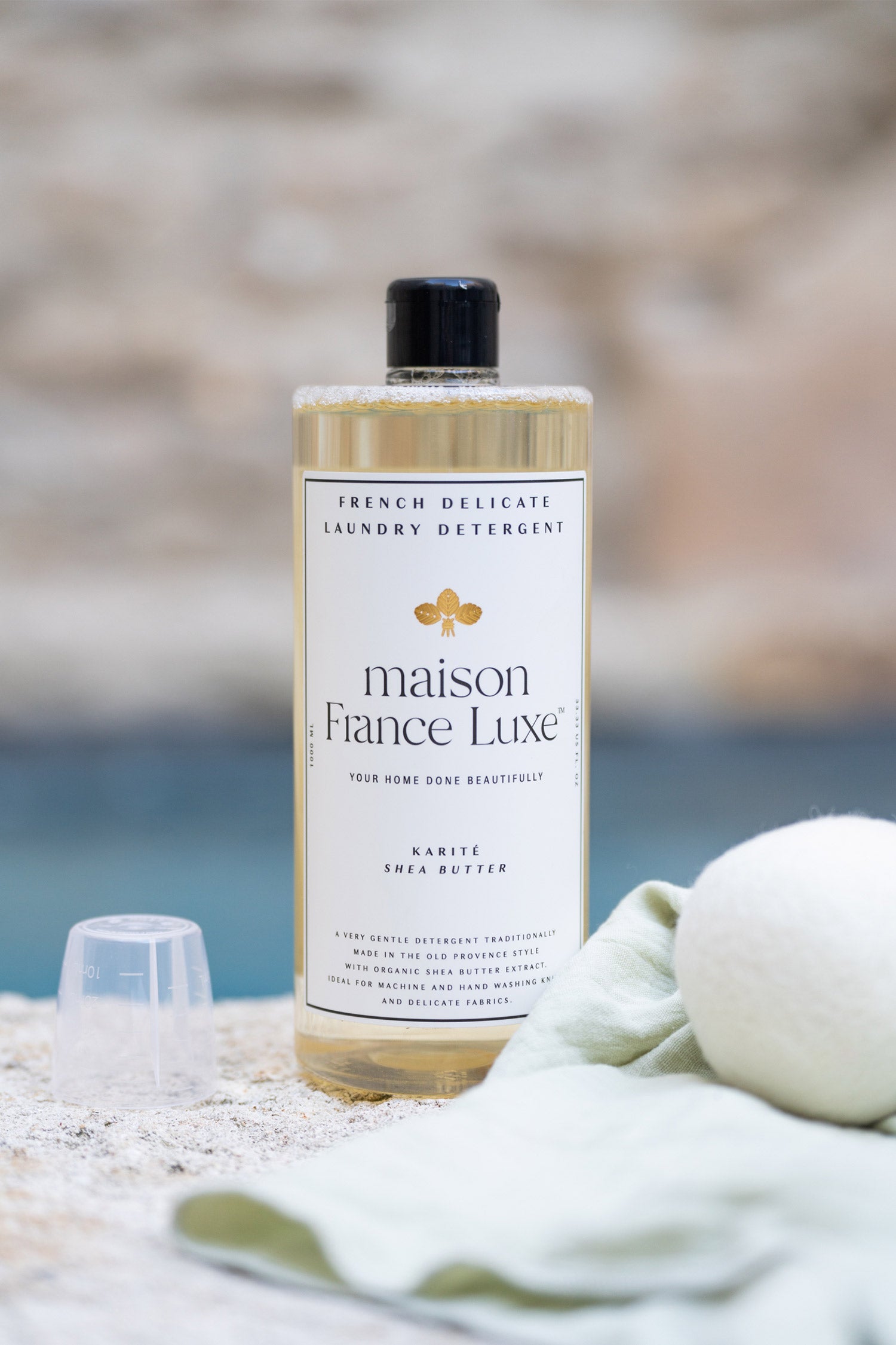 Luxurious, delicate laundry detergent with a subtle shea butter scent. Made in France.